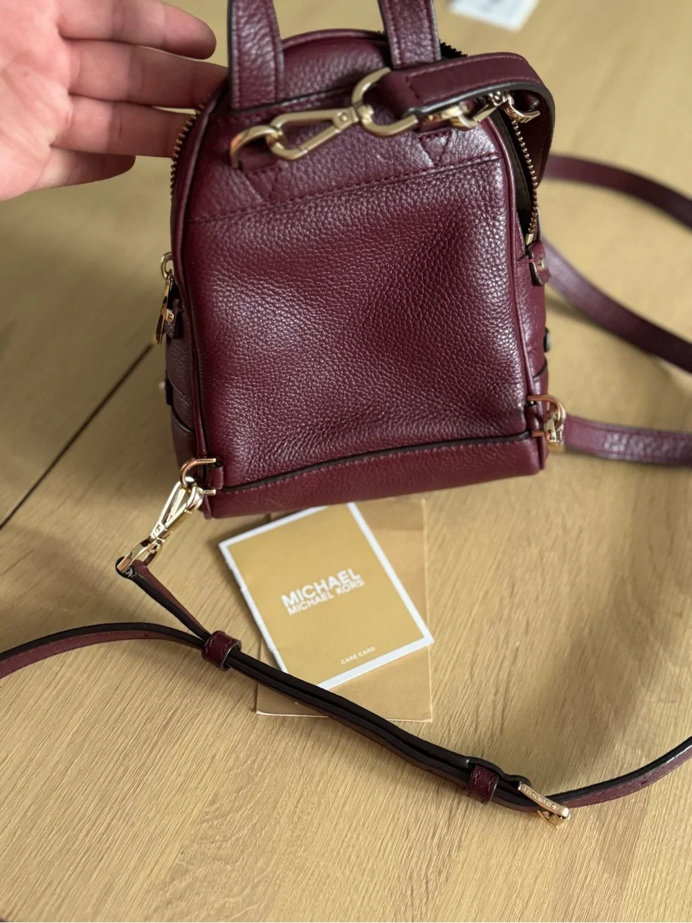 Michael Kors Burgundy Pebbled Leather Mini Backpack with Gold Hardware